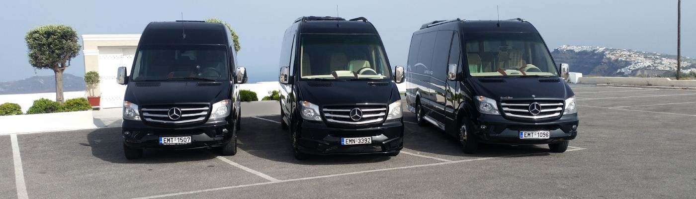 private minibuses waiting above the port, the leg after the boat ride from Athens